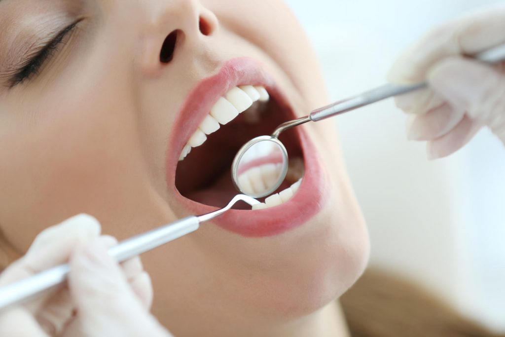 patient getting pain-free dentistry in Las Vegas cleaning