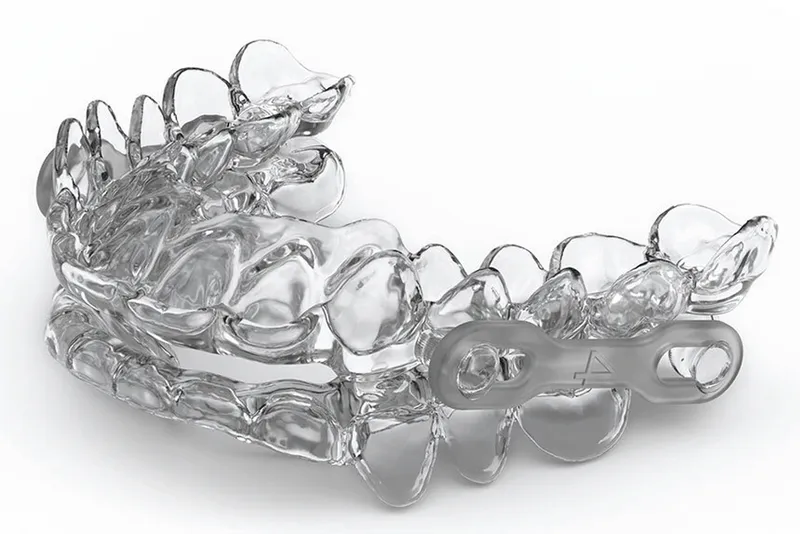 Close up of a clear aligner.