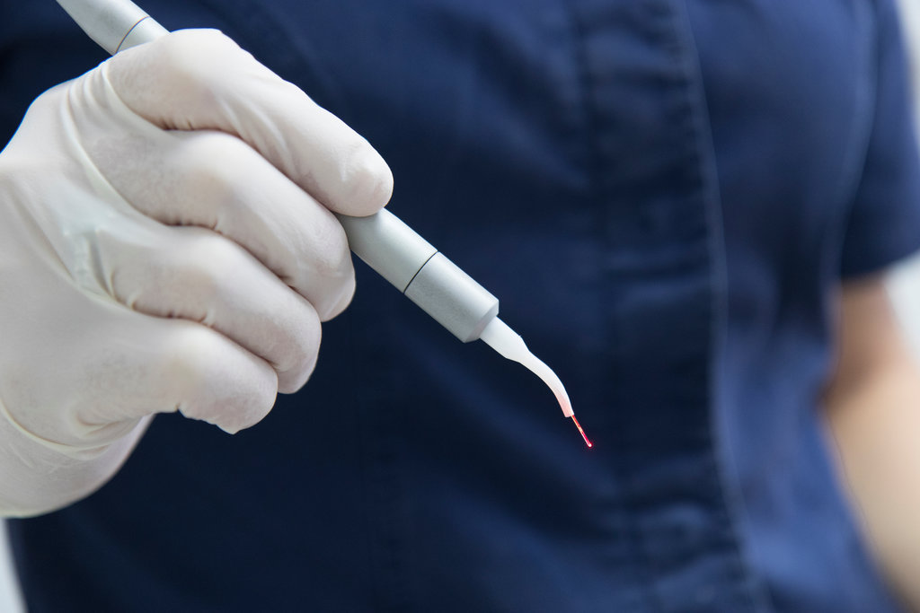 Close up on a surgical micro laser scalpel blade